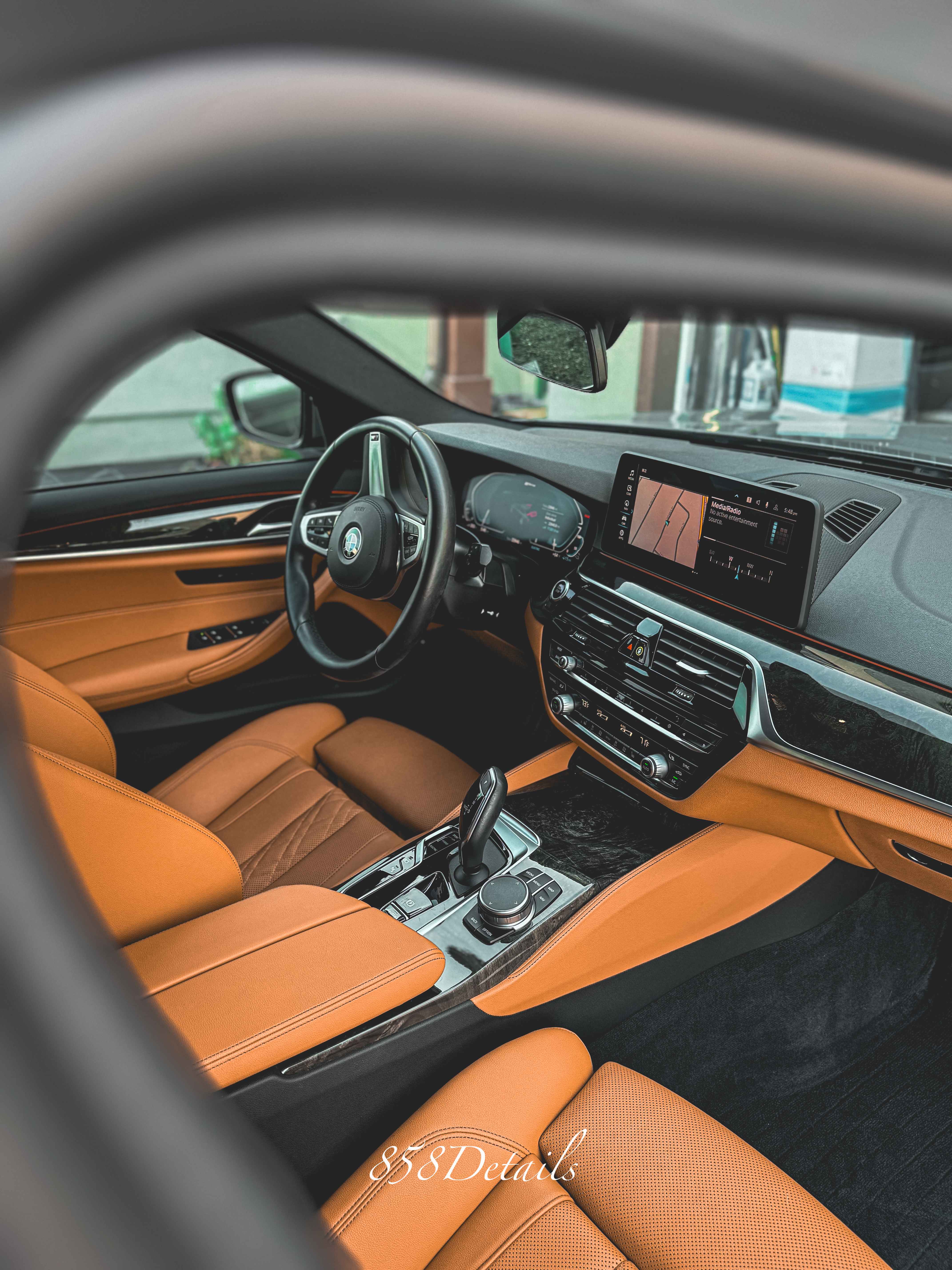 BMW luxury interior with cognac leather seats professionally detailed
